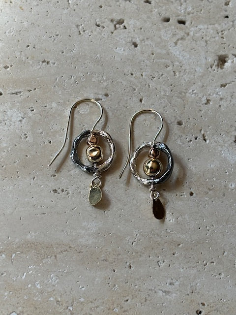 protective circle earrings Hivebraddon